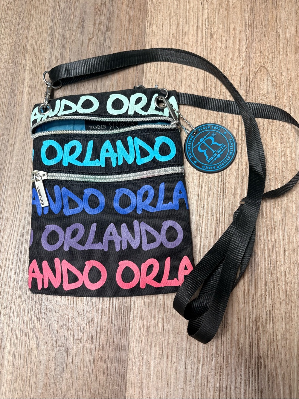 Robin Ruth Orlando Script Crossbody Bag - Black with Aqua, Blue, Purple & Pink